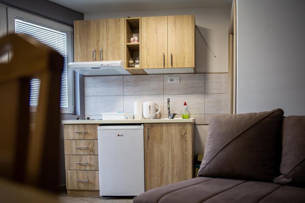 Kuchyň nebo kuchyňský kout v ubytování S&M Apartmani
