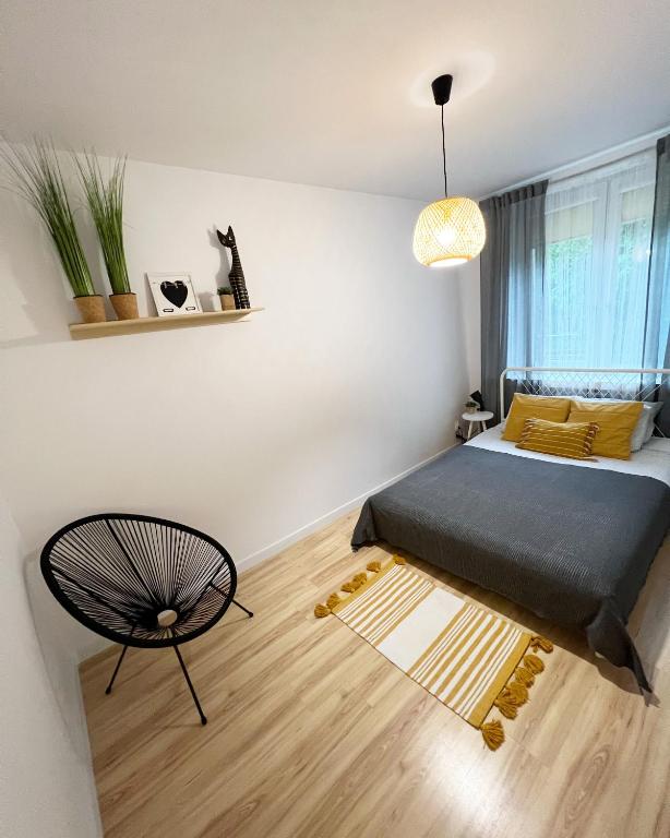 Posteľ alebo postele v izbe v ubytovaní Warszawska 1 Apartament Giżycko