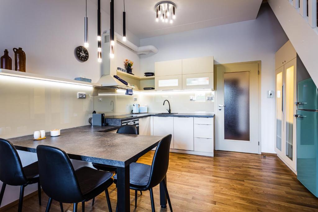 Kuchyň nebo kuchyňský kout v ubytování U Pivovaru - Apartments Boží Dar