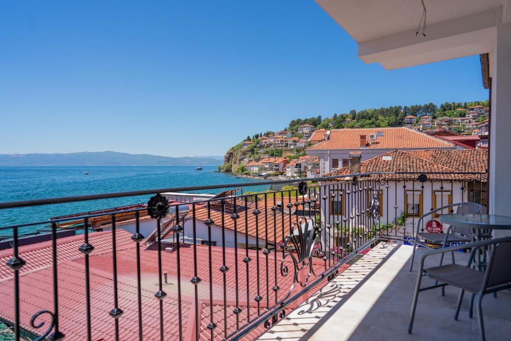 a balcony with a view of the water at Villa Afrodita Lake View in Ohrid