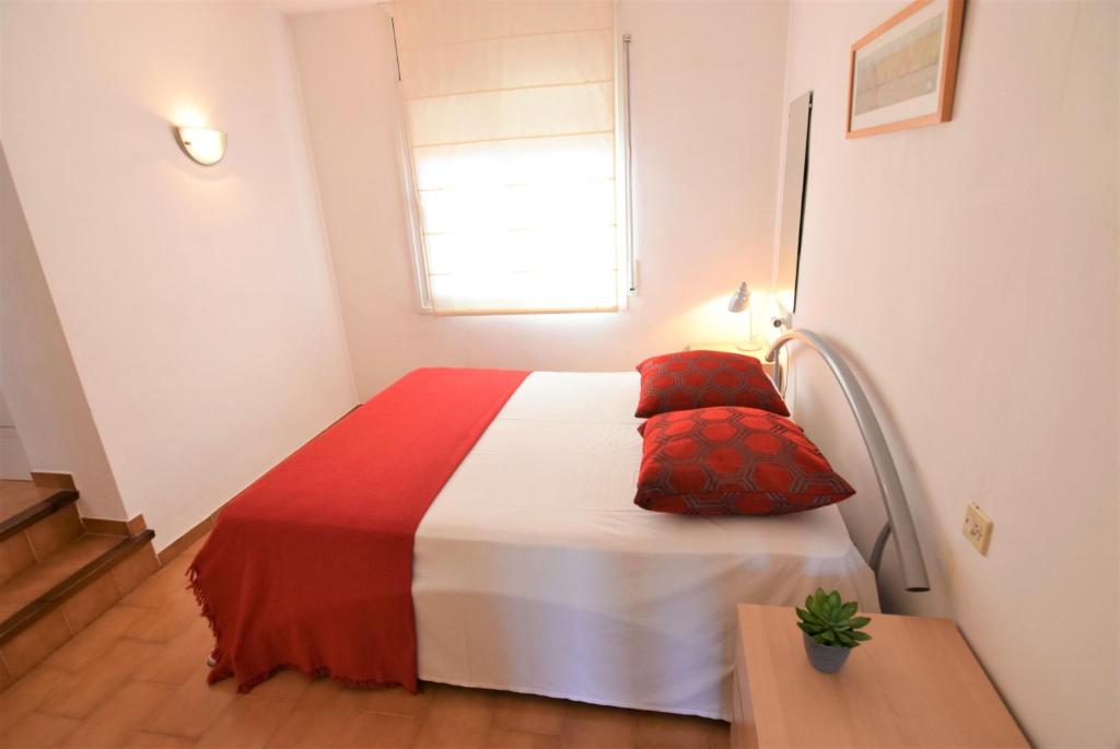 Postel nebo postele na pokoji v ubytování 394-Duplex moderno cerca playa y en pleno centro