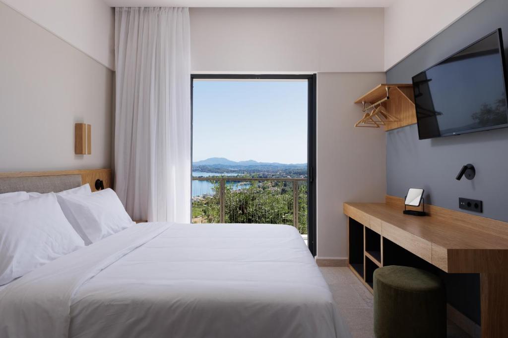 Postel nebo postele na pokoji v ubytování Greenstone Villas