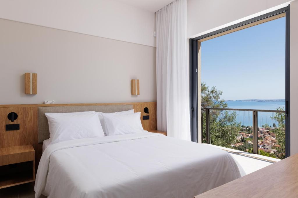 Postel nebo postele na pokoji v ubytování Greenstone Villas