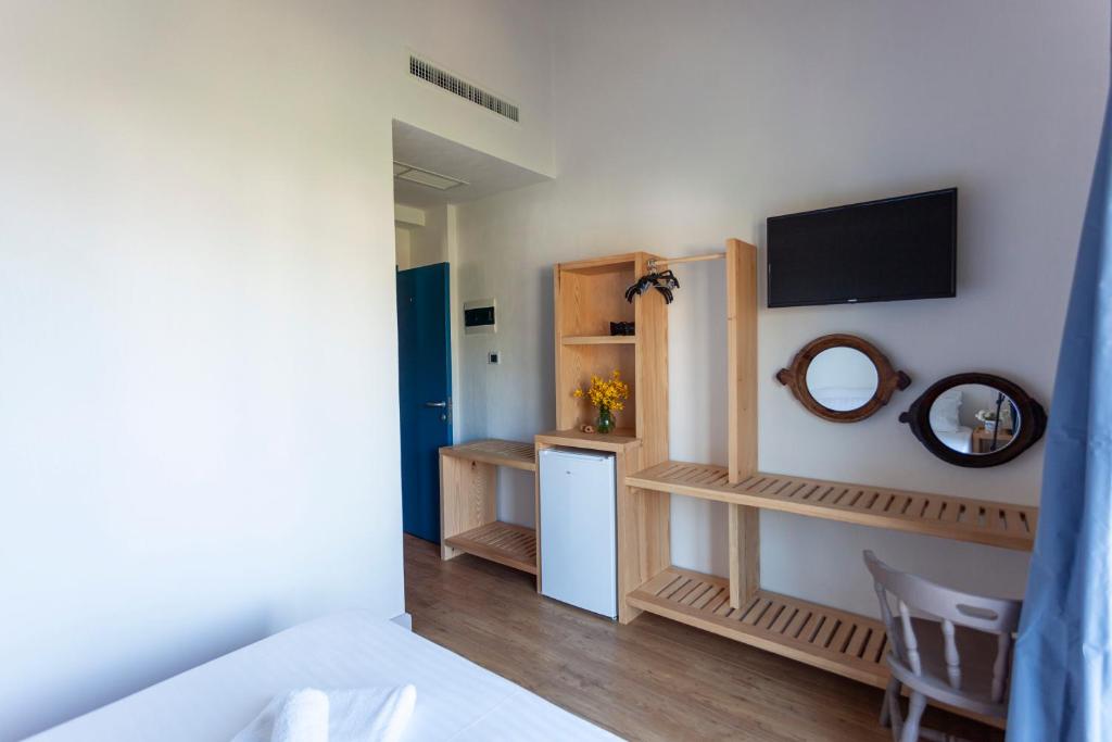 TV a/nebo společenská místnost v ubytování Toni Retzo Rooms