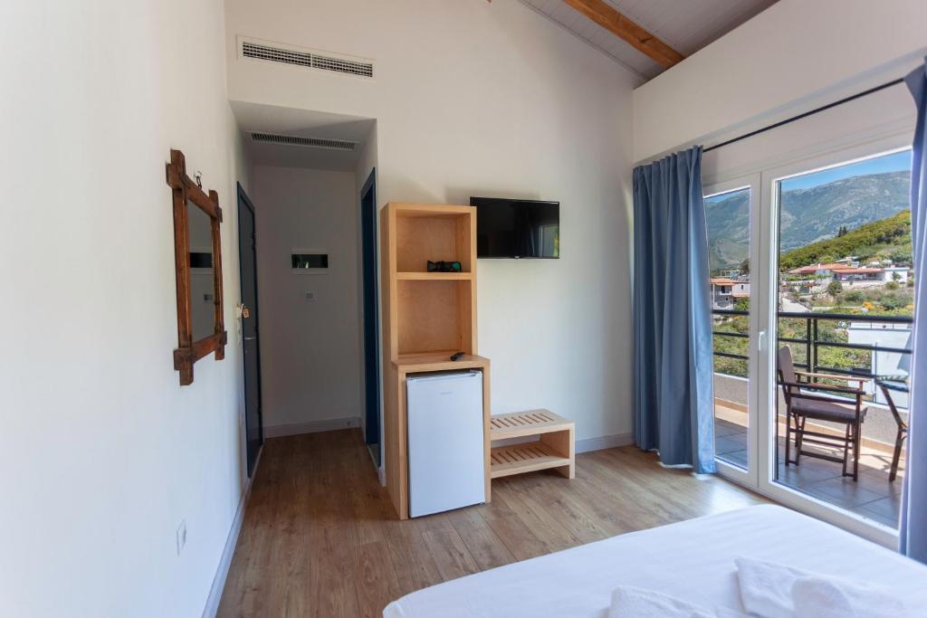 Postel nebo postele na pokoji v ubytování Toni Retzo Rooms