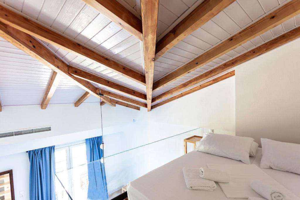 Postel nebo postele na pokoji v ubytování Toni Retzo Rooms