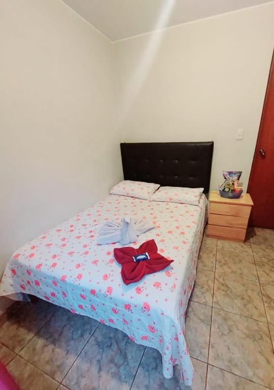 Postel nebo postele na pokoji v ubytování Hostal Kmr