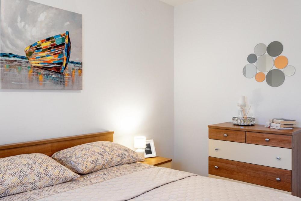 Postel nebo postele na pokoji v ubytování Apartman Maria, Čiovo