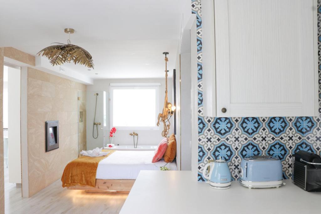 Postel nebo postele na pokoji v ubytování LOFT PLAYA SALINAS CALPE, Grupo Terra de Mar, alojamientos con encanto