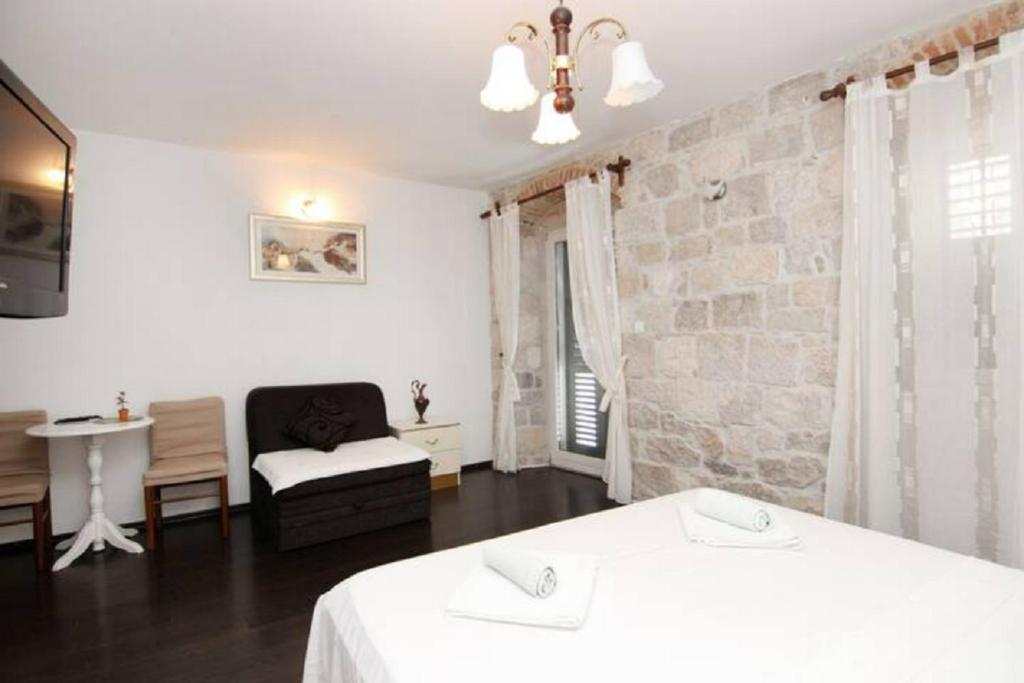 Posteľ alebo postele v izbe v ubytovaní Apartments Centrum Split