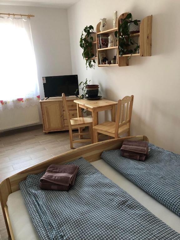Televízia a/alebo spoločenská miestnosť v ubytovaní Fazekas Vendégház