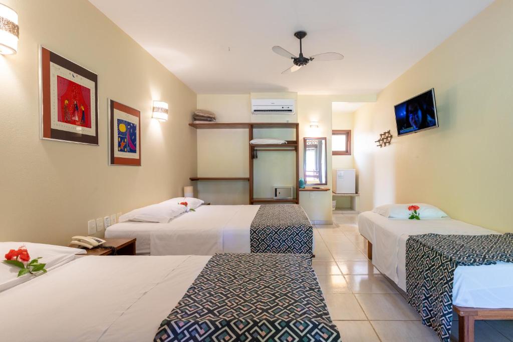Postel nebo postele na pokoji v ubytování Canto d Alvorada Hotel Pousada