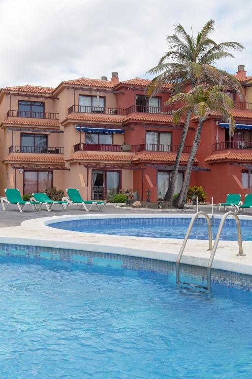 a view of a resort with a swimming pool at Casa Ramón Acosta in Breña Baja