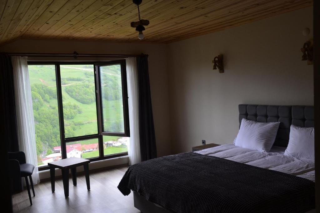 Кровать или кровати в номере Alya Teras Otel