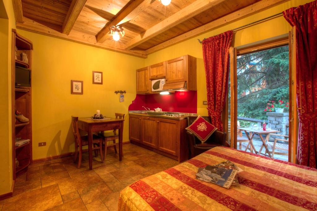 Postel nebo postele na pokoji v ubytování B&B Residence Checrouit
