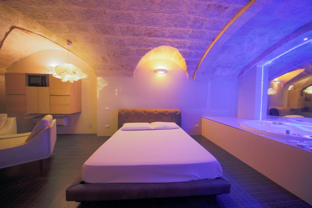 Postel nebo postele na pokoji v ubytování Cleros Sky Lounge