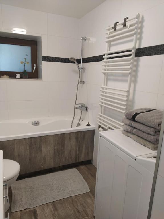 Kúpeľňa v ubytovaní Apartament z tarasem