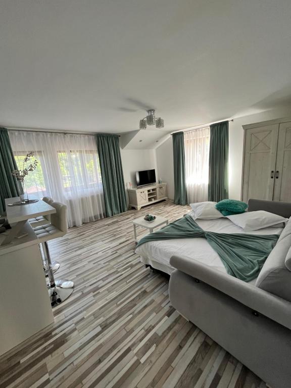 Postel nebo postele na pokoji v ubytování Casa Inna