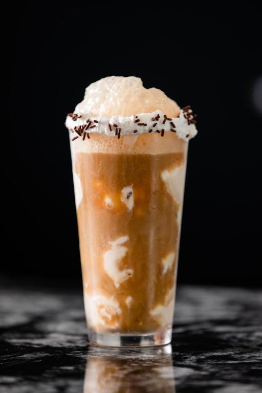 a glass of iced coffee sitting on a table at Gold Country Casino Resort in Oroville