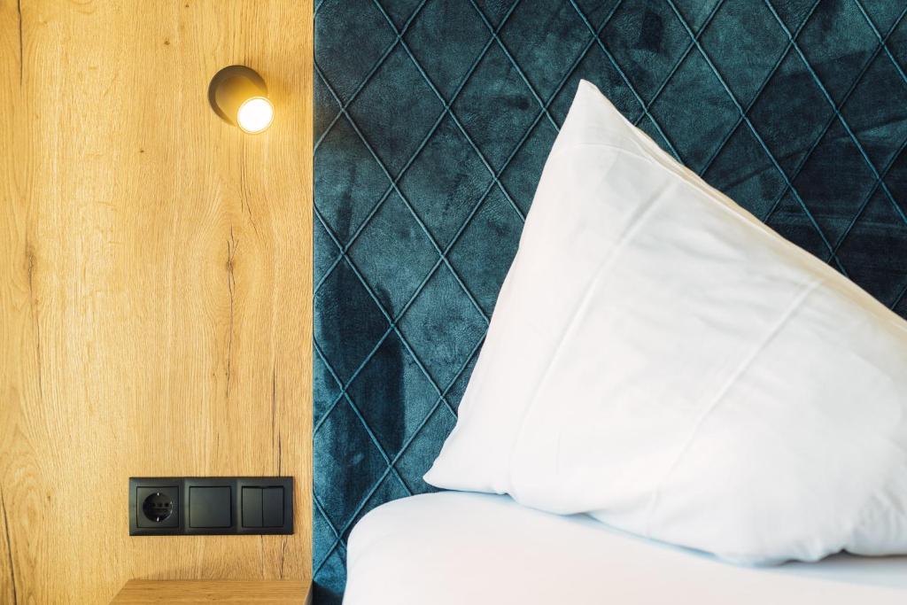 Postel nebo postele na pokoji v ubytování Hotel Alpenroyal