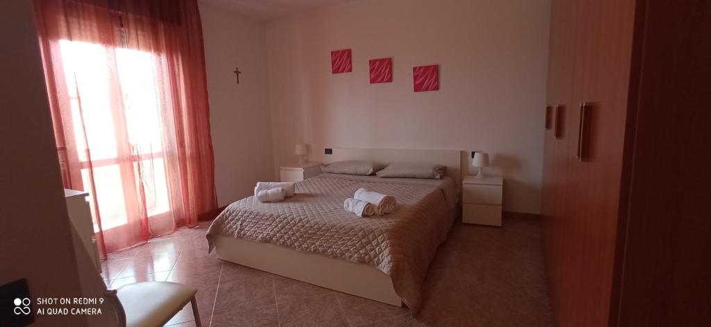 Postel nebo postele na pokoji v ubytování Garda View Apartment