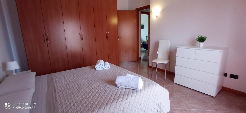 Postel nebo postele na pokoji v ubytování Garda View Apartment