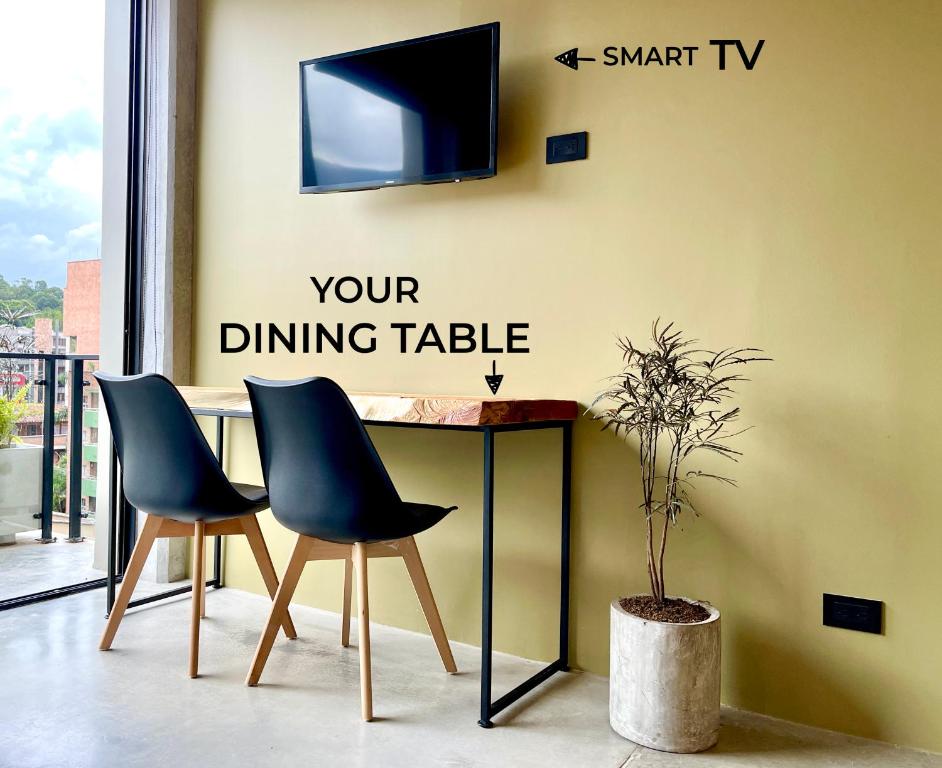 TV a/nebo společenská místnost v ubytování beminimal Hotel