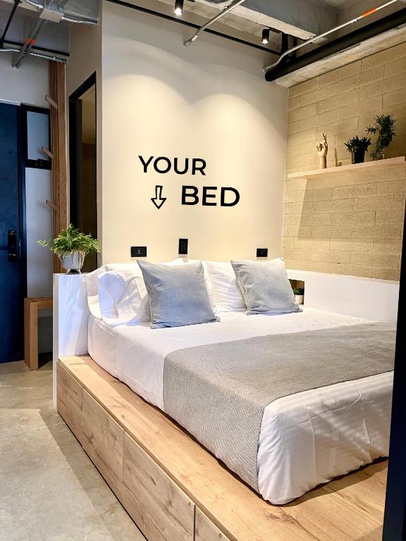 Postel nebo postele na pokoji v ubytování beminimal Hotel
