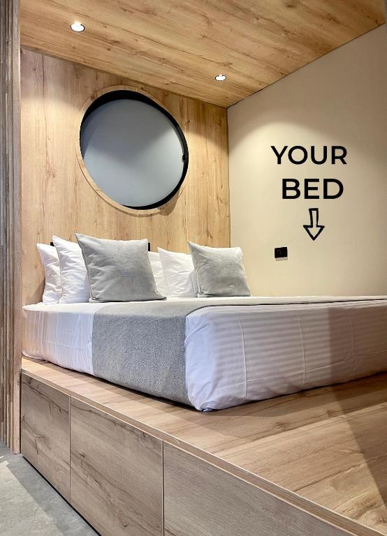 Postel nebo postele na pokoji v ubytování beminimal Hotel