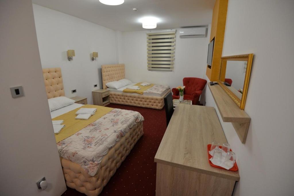 Postel nebo postele na pokoji v ubytování Prenoćište Bis