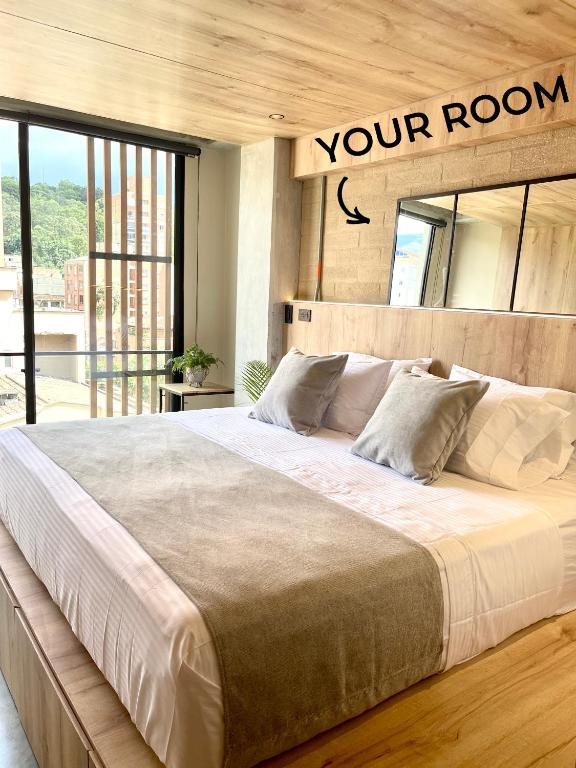 Postel nebo postele na pokoji v ubytování beminimal Hotel