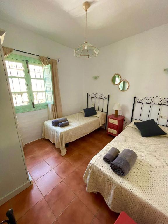 Posteľ alebo postele v izbe v ubytovaní Casa Salamanquesa