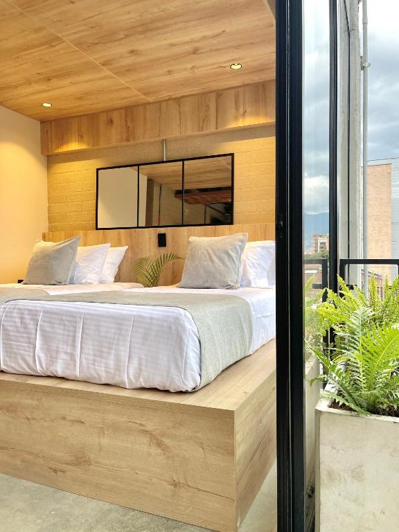 Postel nebo postele na pokoji v ubytování beminimal Hotel