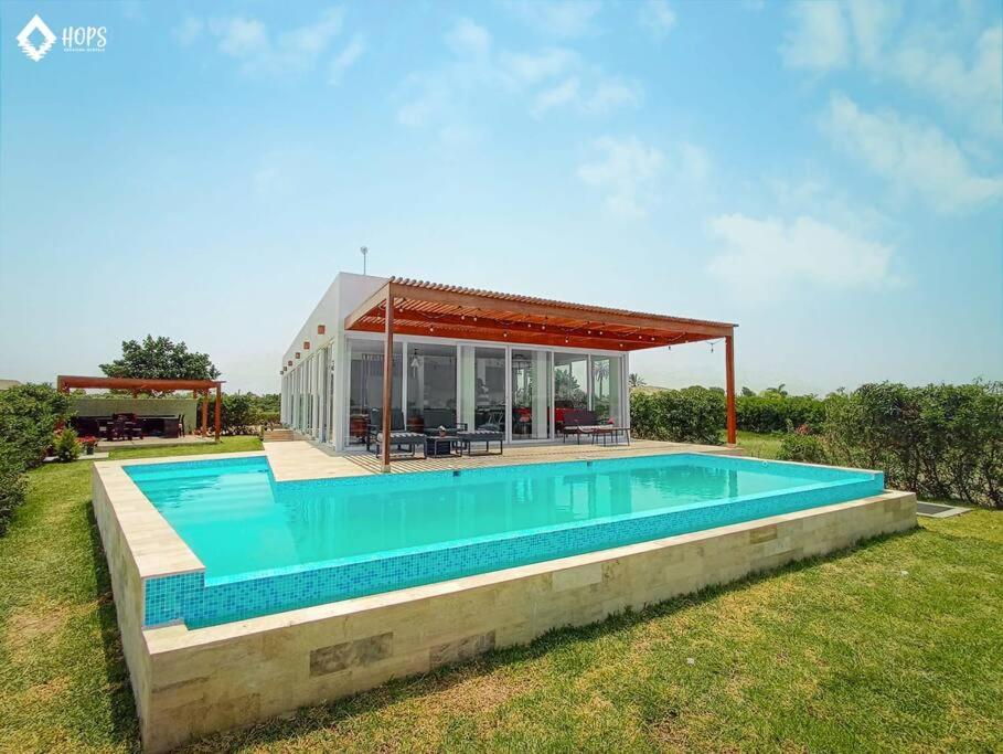 Πισίνα στο ή κοντά στο HOP BUZIOS exclusiva oasis y playa en Chincha