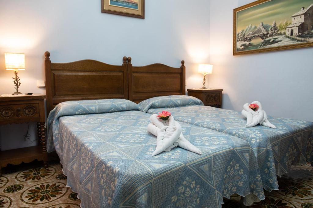 Postel nebo postele na pokoji v ubytování La torrevia2