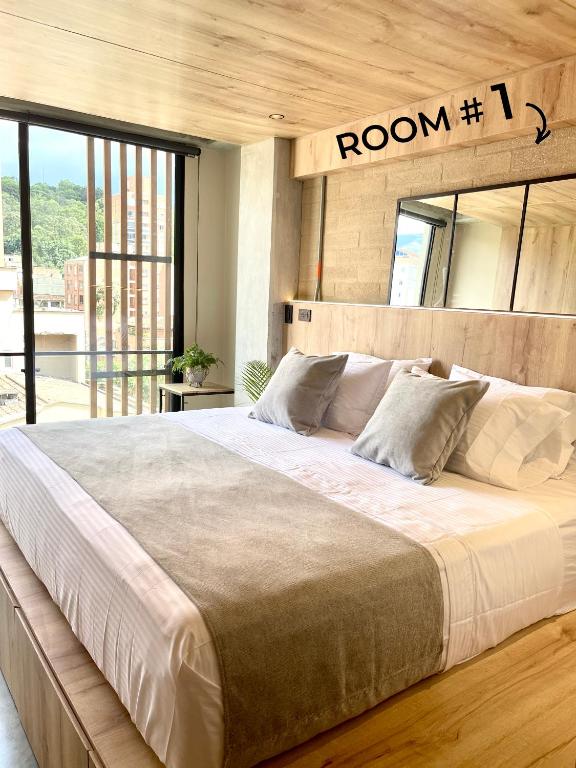 Postel nebo postele na pokoji v ubytování beminimal Hotel
