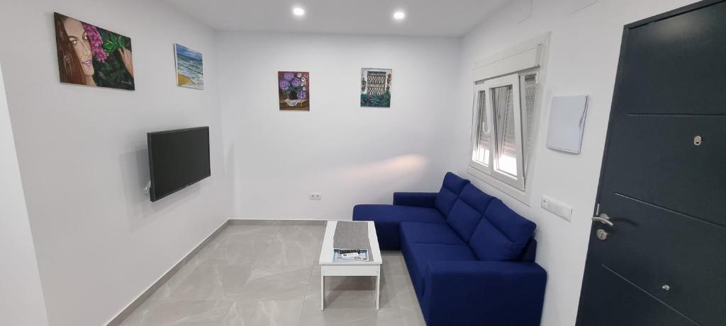 TV a/nebo společenská místnost v ubytování Apartamentos La Playa