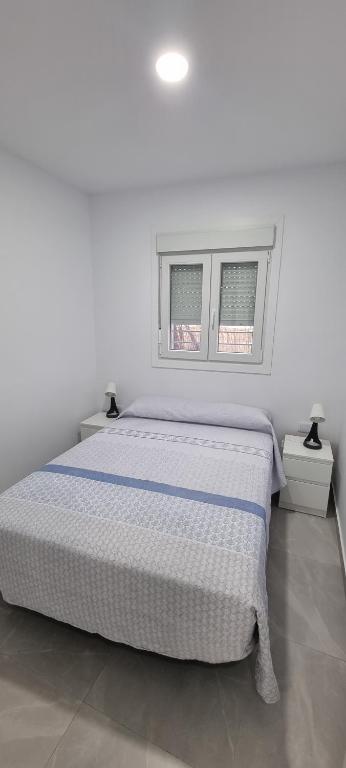 Postel nebo postele na pokoji v ubytování Apartamentos La Playa
