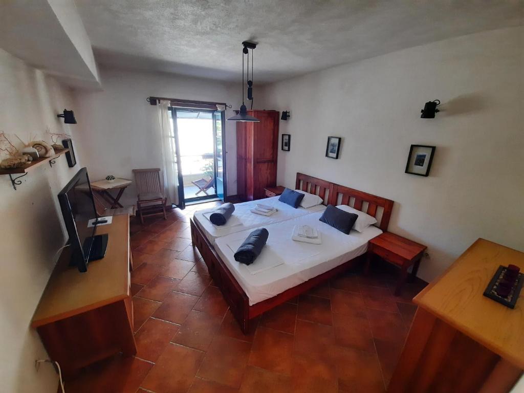 Postel nebo postele na pokoji v ubytování Apartments Jelena Skver