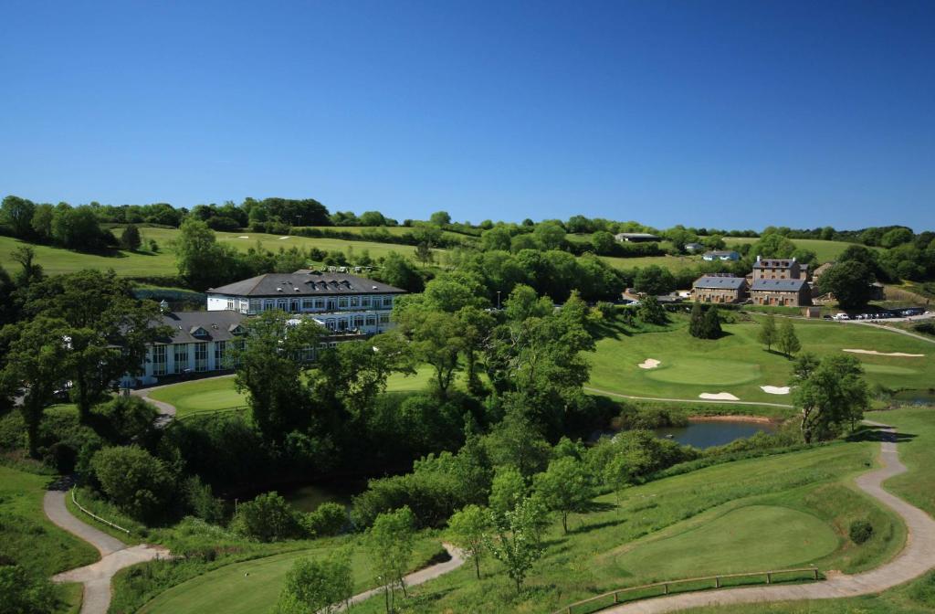 an aerial view of the golf course at a resort at Best Western The Dartmouth Hotel, Golf & Spa in Dartmouth