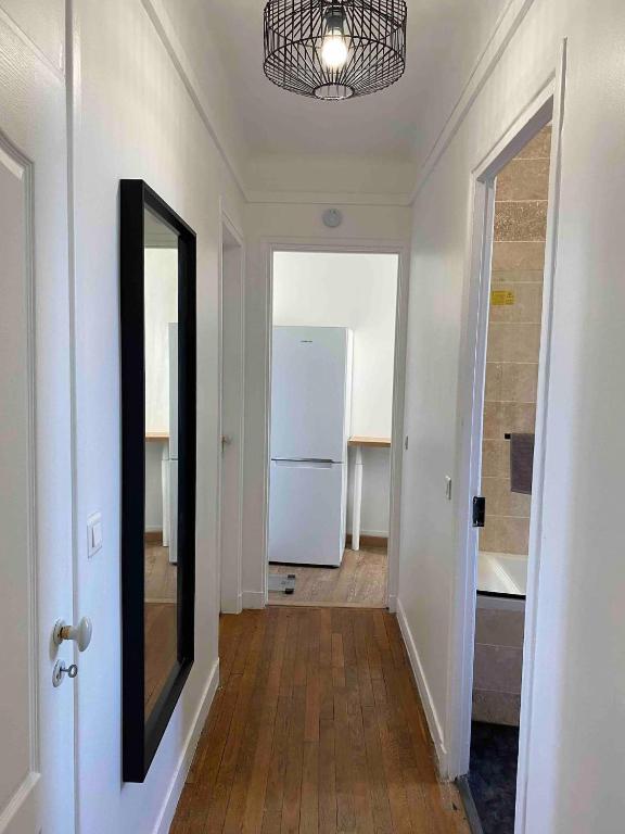 Kuchyň nebo kuchyňský kout v ubytování Chambre cosy et proche des sites Olympiques