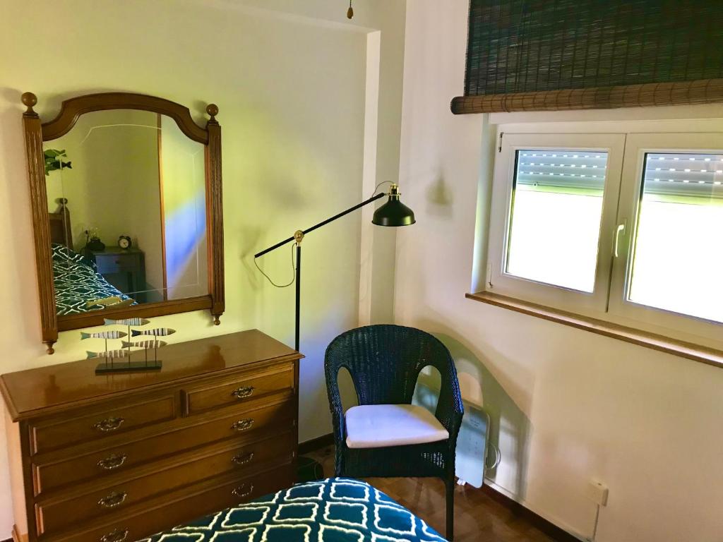 Postel nebo postele na pokoji v ubytování La Casina de Colores de Cudillero