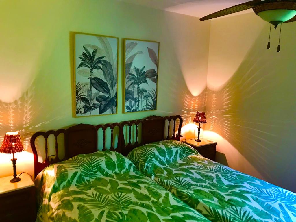 Postel nebo postele na pokoji v ubytování La Casina de Colores de Cudillero
