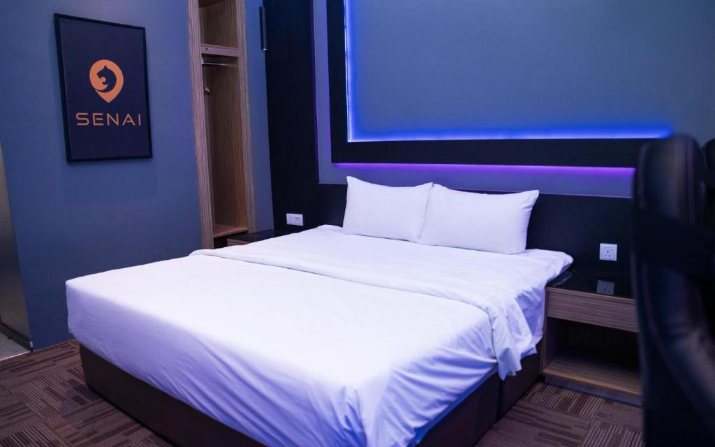Postel nebo postele na pokoji v ubytování SEM9 Senai "Formerly Known As Perth Hotel"