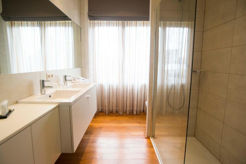 Koupelna v ubytování Grand Hotel Belle Vue