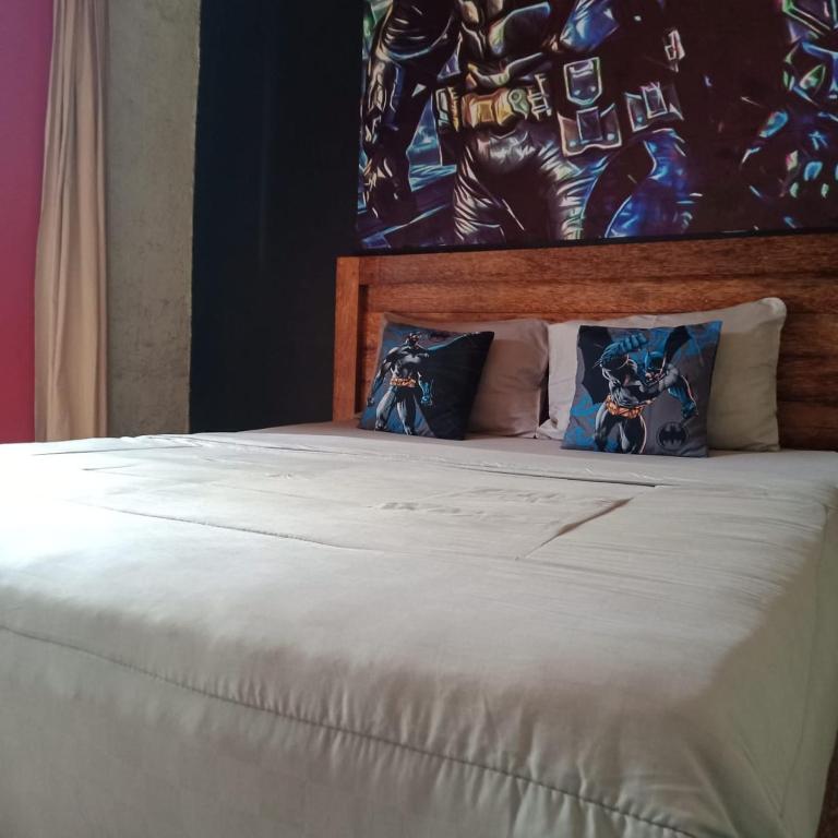 Postel nebo postele na pokoji v ubytování Dragonfly Hostel and Homestay