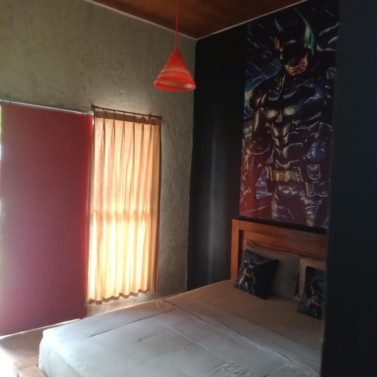 Postel nebo postele na pokoji v ubytování Dragonfly Hostel and Homestay