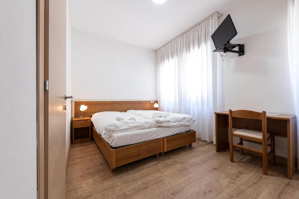 Postel nebo postele na pokoji v ubytování Maso dell Apicoltore