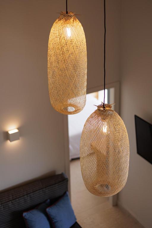 Postel nebo postele na pokoji v ubytování Greenstone Villas