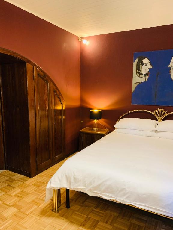 Posteľ alebo postele v izbe v ubytovaní Casa Robina